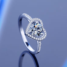 Load image into Gallery viewer, MysticFlavia Radian Heart Solitaire MOISSANITE Silver Ring angled view showing pavé band

