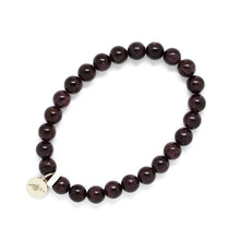 Load image into Gallery viewer, Natural Garnet Birthstone Flat Silver Bead Bracelet 8mm by Mystic Flavia worn on a woman's wrist for an elegant everyday look.
