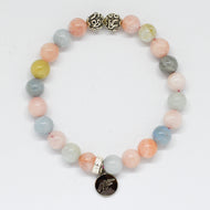 Natural Morganite Stone Silver Bead Bracelet 8mm with decorative silver beads and Mystic Flavia charm on a white background.
