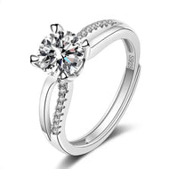 Moissanite ring with round center stone and pavé split band in 925 sterling silver
