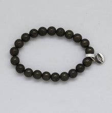 Load image into Gallery viewer, MysticFlavia natural pyrite bracelet with silver charm, side angle view on white background
