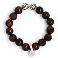 MysticFlavia red tiger eye bracelet with silver beads and round charm, white background