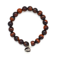 MysticFlavia red tiger eye flat bead bracelet with round silver charm, white background
