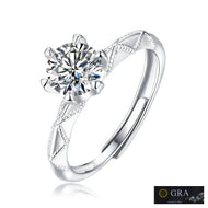 Moissanite solitaire silver ring with twisted band and round center stone