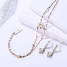 Load image into Gallery viewer, Rose Gold White Zircon Bracelet &amp; Earring Set showing the matching bracelet and earrings.
