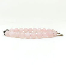 Load image into Gallery viewer, Side profile of MysticFlavia matte rose quartz bead bracelet with soft pink 8mm round stones

