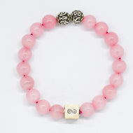 Rose quartz bracelet with round pink beads and infinity silver bead on white background by MysticFlavia