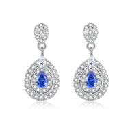 Blue gemstone drop earrings with floral detailing in 925 sterling silver by MysticFlavia