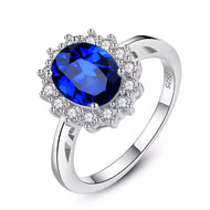 Blue gemstone silver ring with American diamond halo in 925 sterling silver