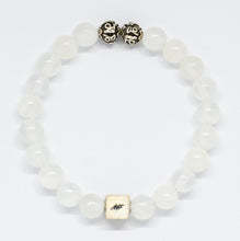 Load image into Gallery viewer, MysticFlavia selenite bracelet with translucent white round beads, two carved silver beads on top and square brand tag, white background

