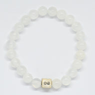 Selenite infinity silver bead bracelet with translucent white beads and square infinity charm at bottom, white background
