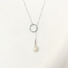 Load image into Gallery viewer, Silver lariat necklace with round pearl drop pendant, close-up product view
