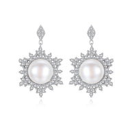 Natural pearl starburst silver earrings with intricate zircon detailing