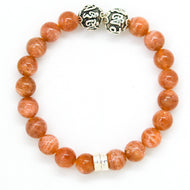 Sunstone super silver bead bracelet 12mm with natural round beads and silver accent beads on a white background