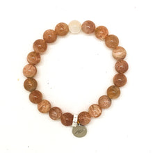 Load image into Gallery viewer, Sunstone bracelet with a single moonstone accent bead and 925 sterling silver charm on white background
