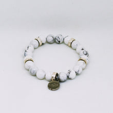 Load image into Gallery viewer, MysticFlavia white howlite bracelet 925 sterling silver spacer beads with dark logo charm side view

