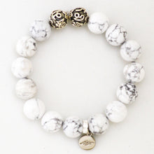 Load image into Gallery viewer, MysticFlavia white howlite bracelet 12mm with ornate silver accent beads and brand charm on white background
