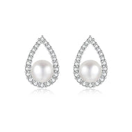 White natural pearl silver teardrop earrings with crystal halo detailing