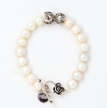 Load image into Gallery viewer, White Pearl Silver Toggle Clasp Bracelet with floral silver accents on a white background
