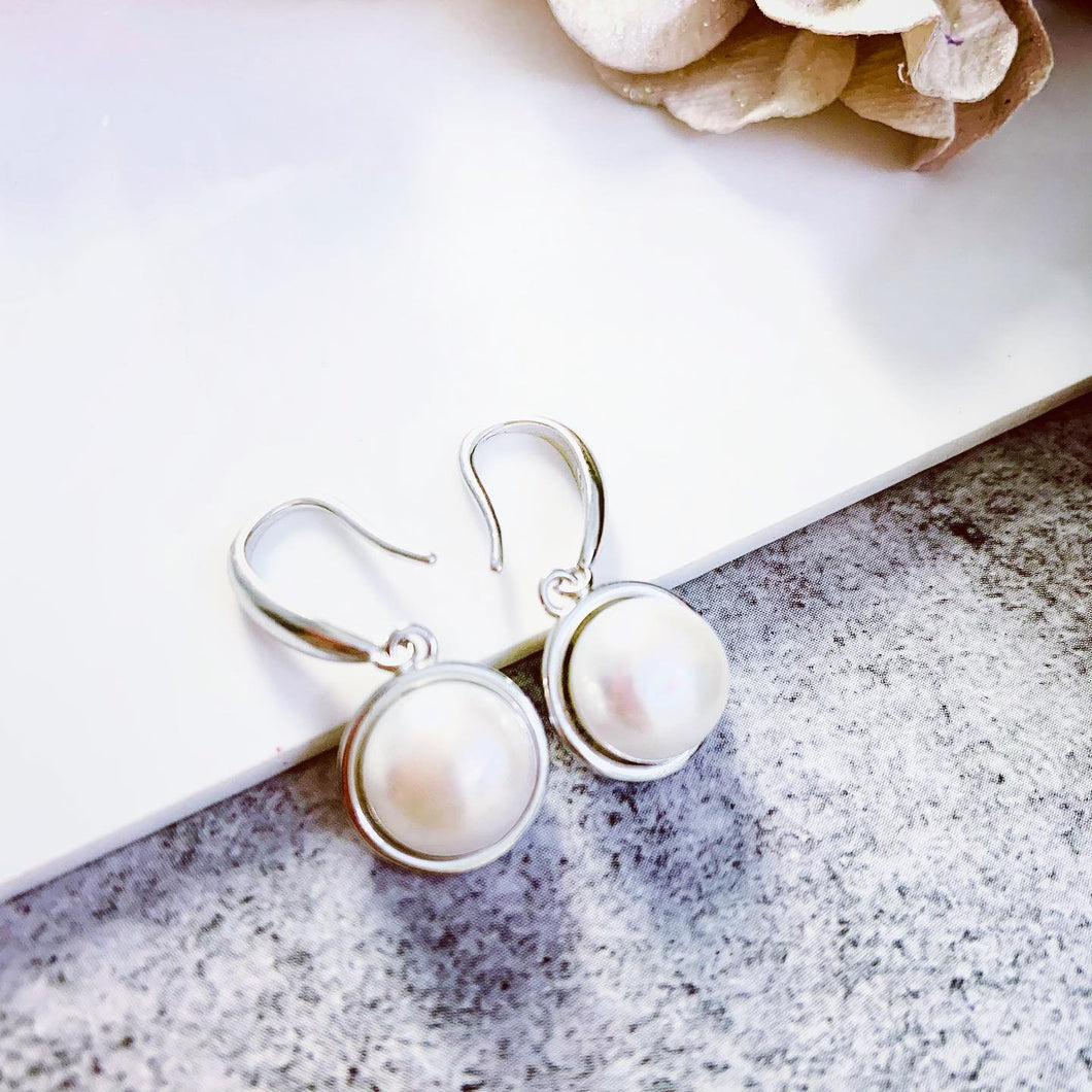 White Tear Drop Natural Pearl Clip on Silver Earrings