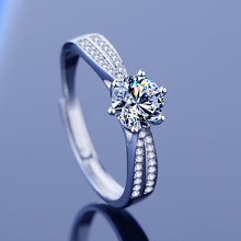 Load image into Gallery viewer, 925 sterling silver moissanite ring shown from a side angle with detailed pavé setting
