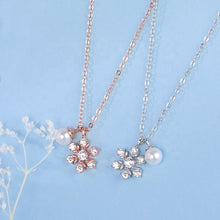 Load image into Gallery viewer, Rose gold snowflake pearl pendant silver necklace displayed with pearl detail
